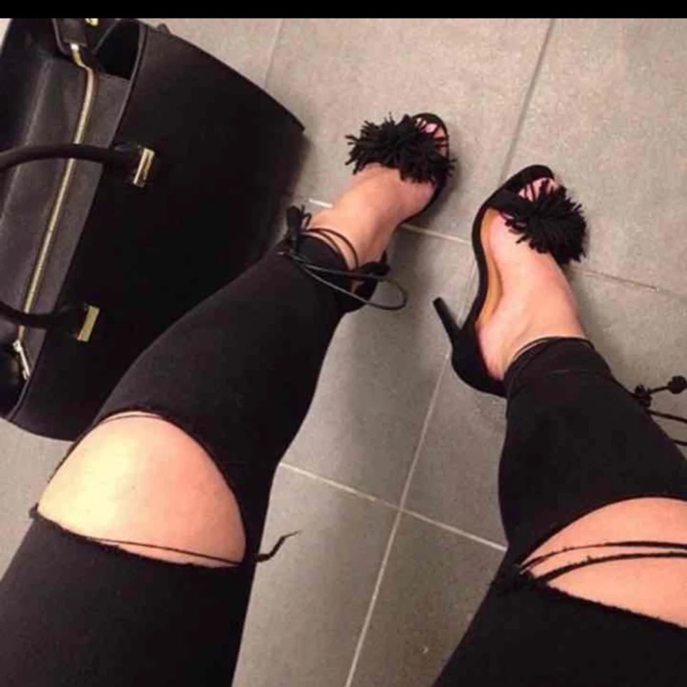 Black fringed heels